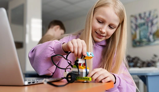 Young student working on Code Commanders robotics project