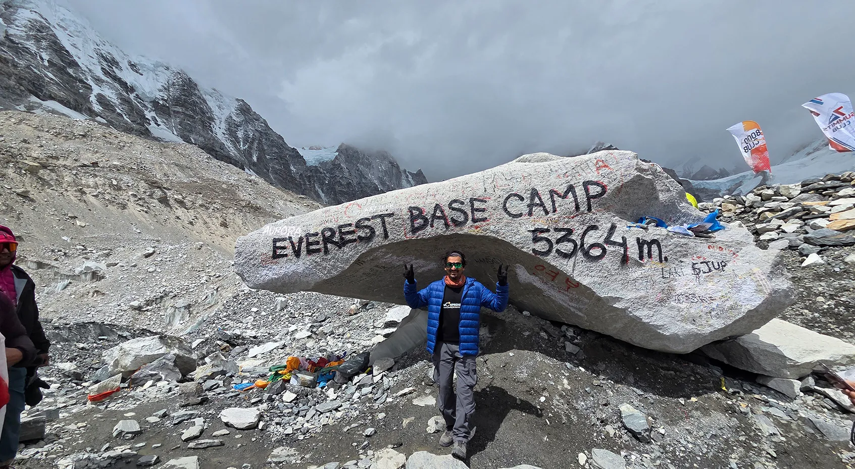 Alok standing at the Everest Base Camp 5,364m marker rock